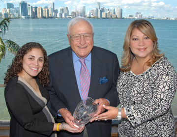 Stuart Newman Receiving Lifetime Achievement Award from Miami PRSA Chapter President